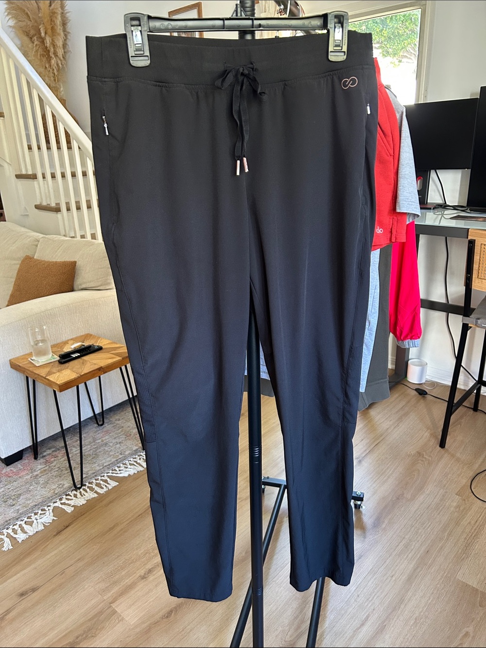 Calia Pant. Size medium. 29” inseam. Drawstring/Zip pockets. Black